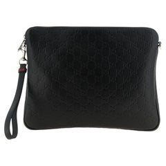 Gucci GG Emblem Crossbody Bag — Black