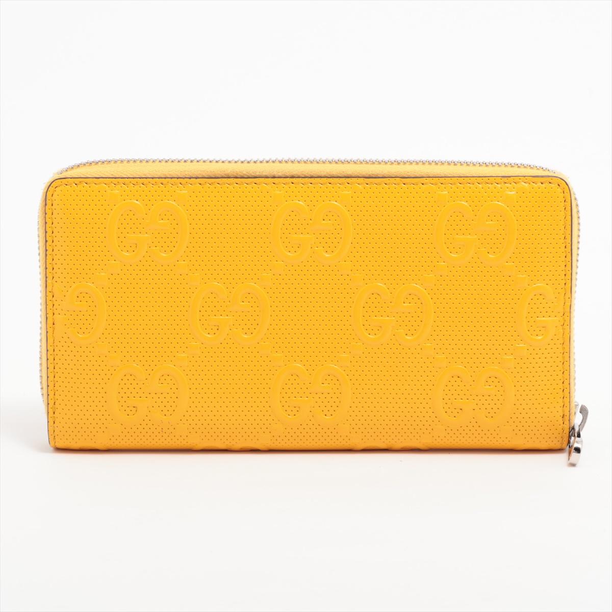 Gucci GG Embossed Leather Zip Long Wallet Yellow In Good Condition For Sale In Indianapolis, IN