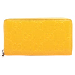 Gucci GG Embossed Leather Zip Long Wallet Yellow