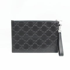 GUCCI GG geprägte Herren-Kupplungstasche 625569 schwarz