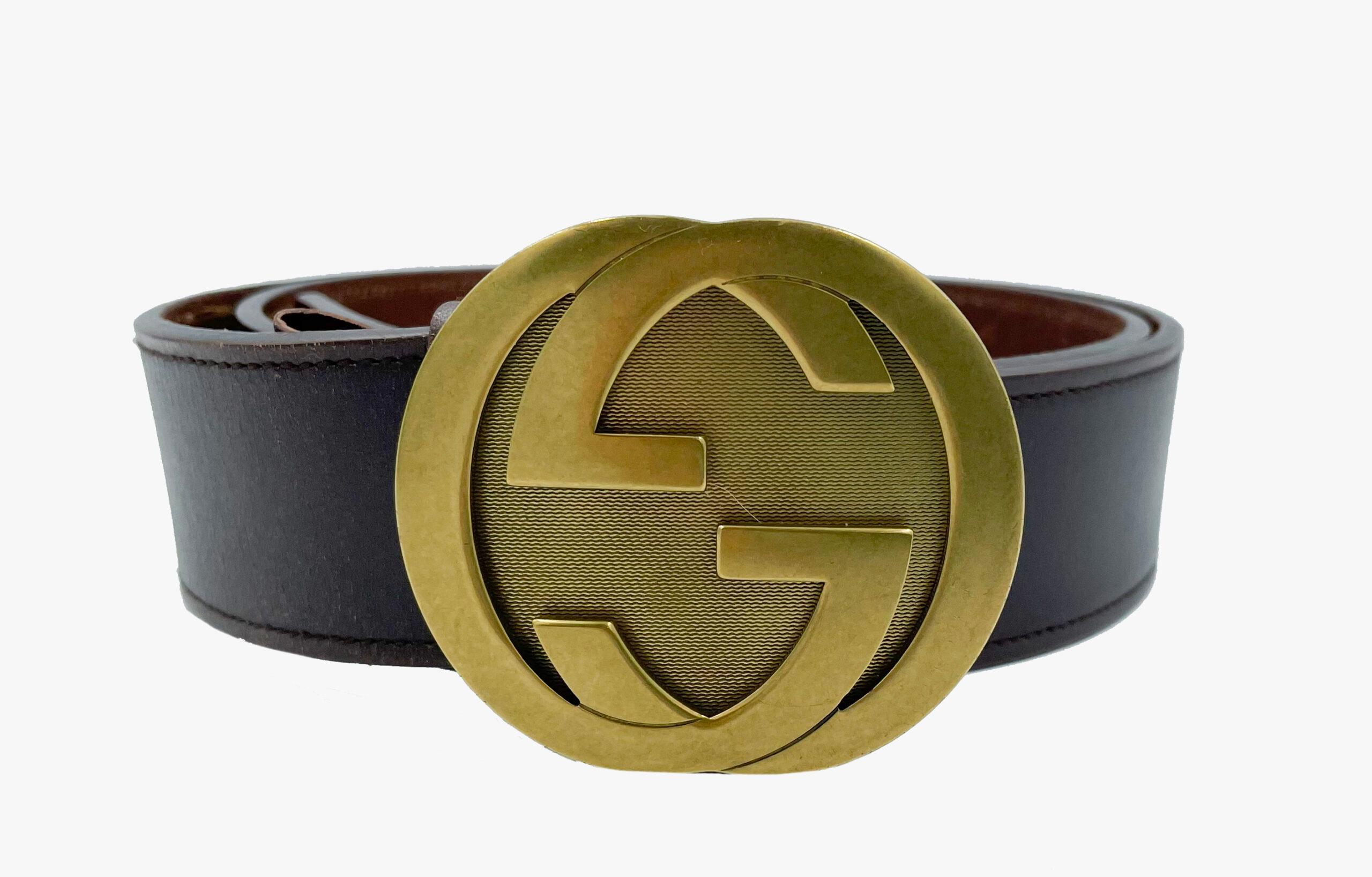 Cintura Gucci GG con fibbia intrecciata in pelle marrone in vendita 1