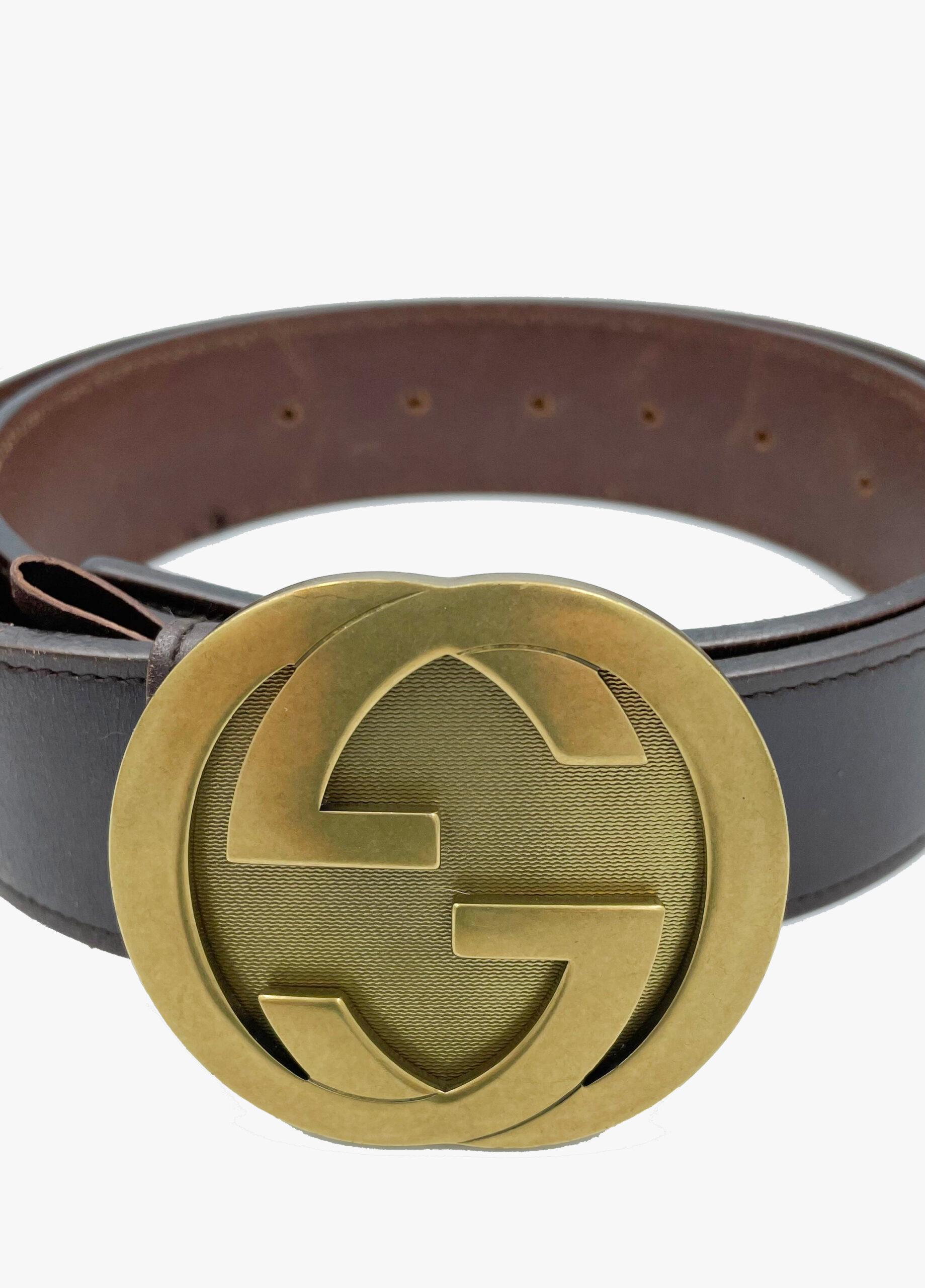 Cintura Gucci GG con fibbia intrecciata in pelle marrone in vendita 2
