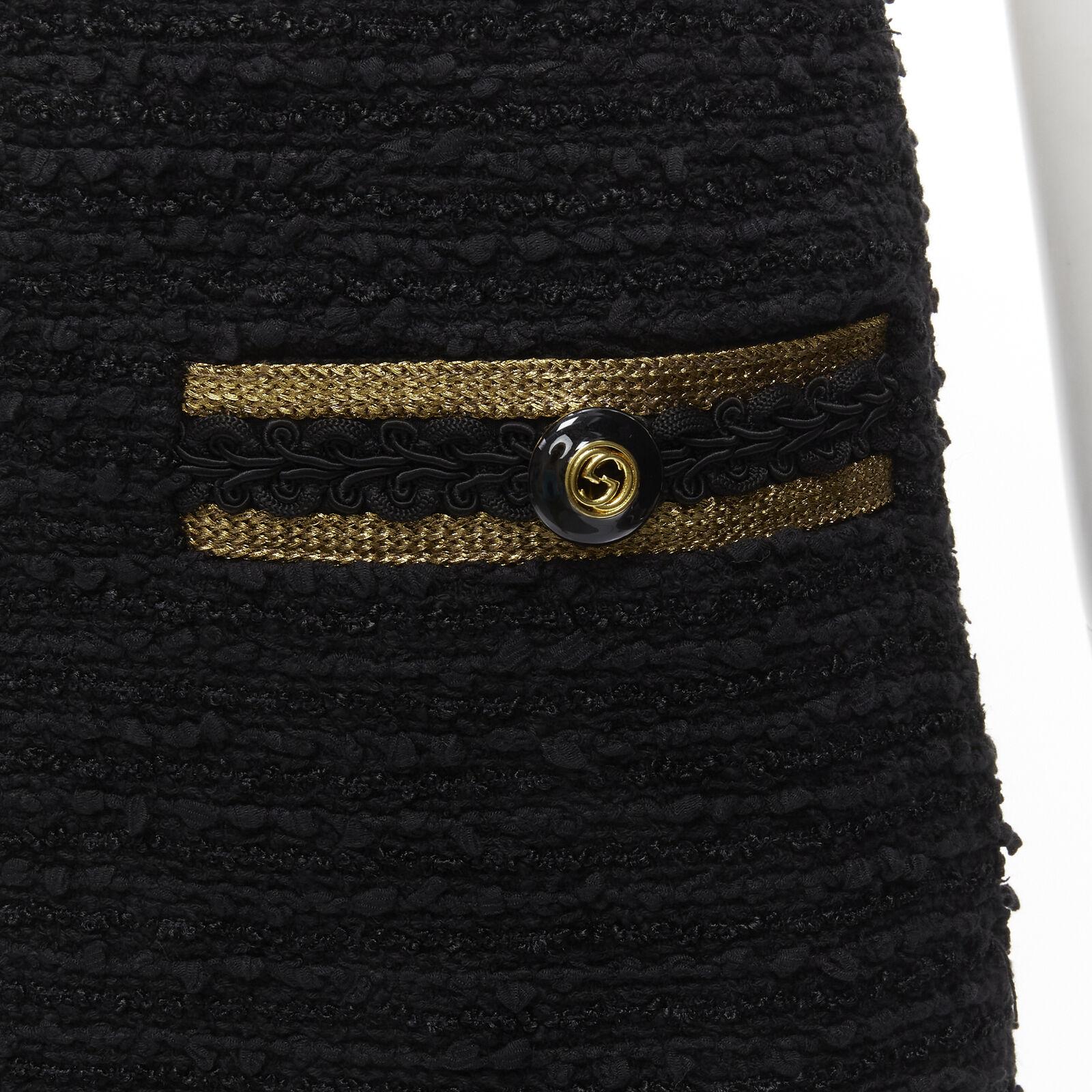 GUCCI GG logo button gold trim black tweed mini A-line skirt IT38 XS
Reference: AAWC/A00374
Brand: Gucci
Designer: Alessandro Michele
Material: Cotton, Blend
Color: Black, Gold
Pattern: Solid
Closure: Zip
Lining: Silk
Extra Details: GG logo