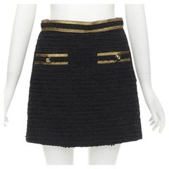 GG Logo GG bouton doré garniture mini jupe A-line en tweed noir IT38 XS