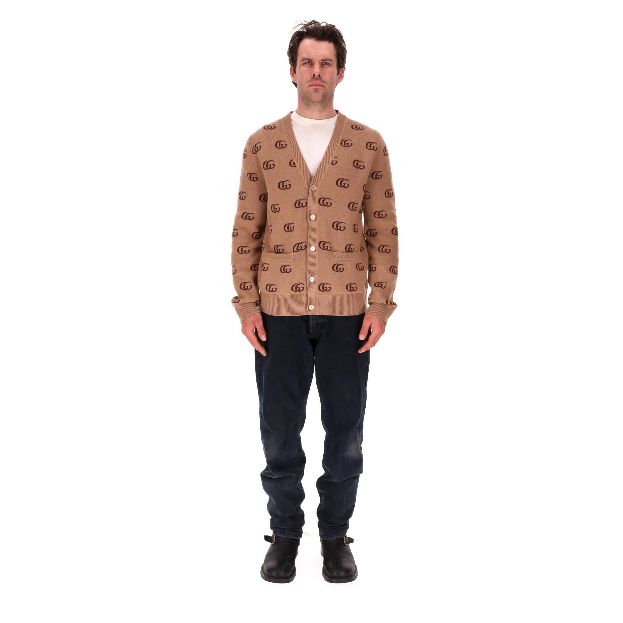 Gucci 'GG' Logo Cashmere & Wool Cardigan With Mother-Of-Pearl Buttons

Brown knitwear crafted on soft cashmere and wool with signature double 'G' all-over print.

Detailed with 'Gucci' engraved mother-pf-pearl button closure. Ribbed cuffs and