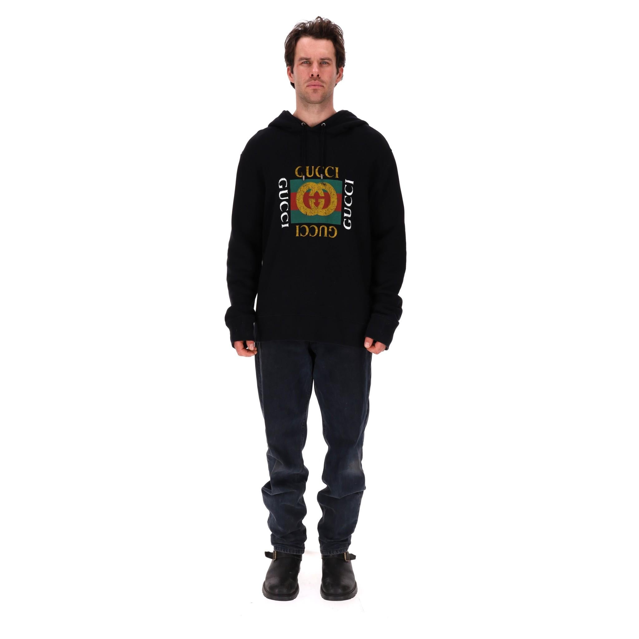 Gucci 'GG' Logo Cotton Hoodie

Black sweatshirt crafted from cotton with signature interlocking G and Web stripe logo to the centre.

Drawstring hood, ribbed cuffs and hem. Rrp Approx. £1,040

Size – XXL

Condition – Very Good

Composition – 100%