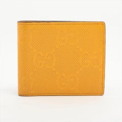 Gucci GG Logo Embossed Leather Compact Wallet Yellow