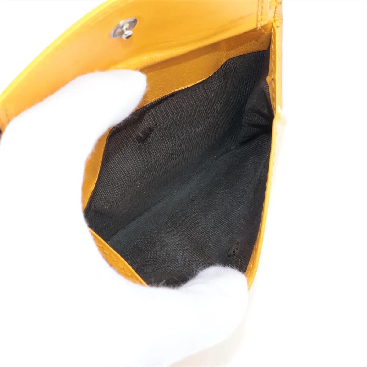 Portafoglio compatto in pelle goffrata GG di Gucci Giallo in vendita 5