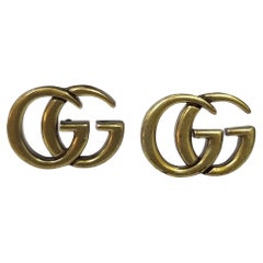 Gucci Ohrringe mit vergoldetem "GG"-Logo