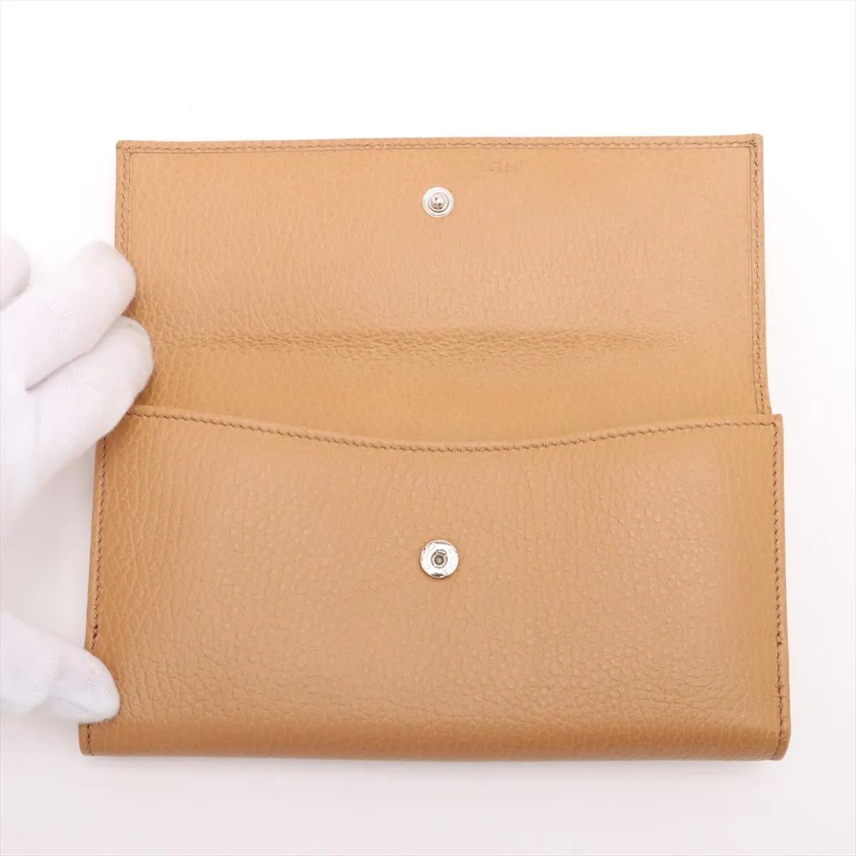 Donna Portafoglio lungo in pelle Gucci GG Logo Sukey Marrone chiaro in vendita