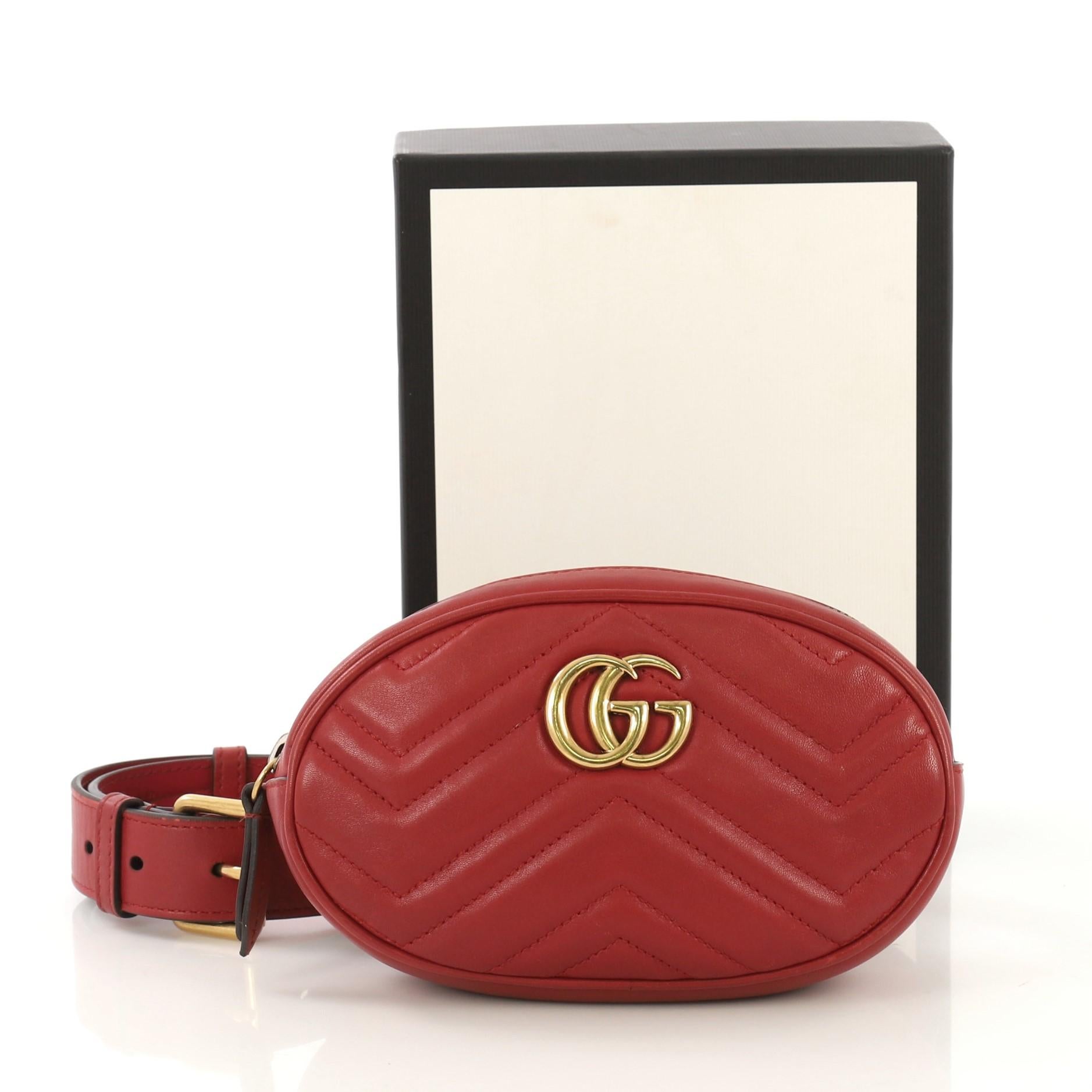 This Gucci GG Marmont Belt Bag Matelasse Leather, crafted in red matelasse leather, features adjustable belt strap, GG logo at front and aged gold-tone hardware. Its zip closure opens to a nude microfiber interior with slip pocket. 

Estimated