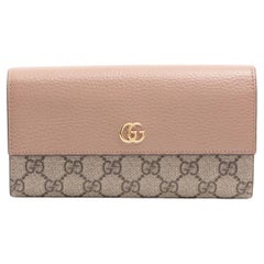 GG Marmont Portafoglio continentale in pelle bicolore Rosa polveroso x Beige di Gucci