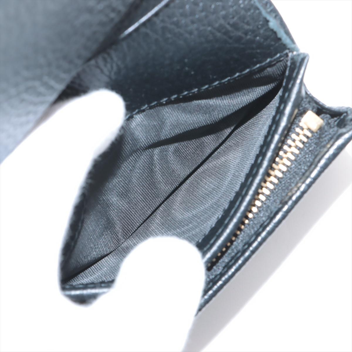 Gucci GG Marmont Bi-color kompakte Leder-Brieftasche Schwarz x Beige im Angebot 1
