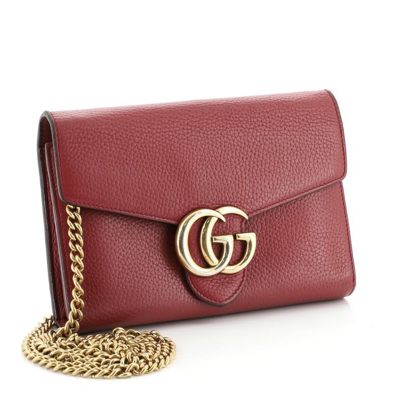 Condition: Fair. Loose closure snap. Moderate wear and darkening on exterior, indentations on front underneath flap, fraying on side base edges. Cracking on flap wax edges, wear and discoloration in interior, scratches and heavy discoloration on