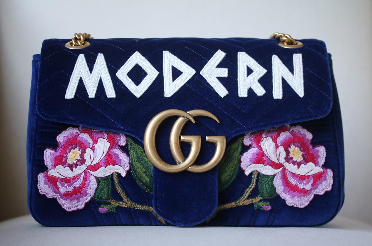 The medium GG Marmont chain shoulder bag has a softly structured shape and an oversized flap closure with Double G hardware. The 