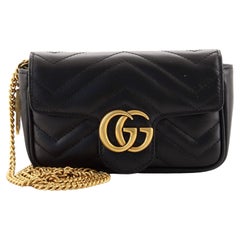 Gucci  Sac à rabat GG Marmont Super Mini en cuir matelassé