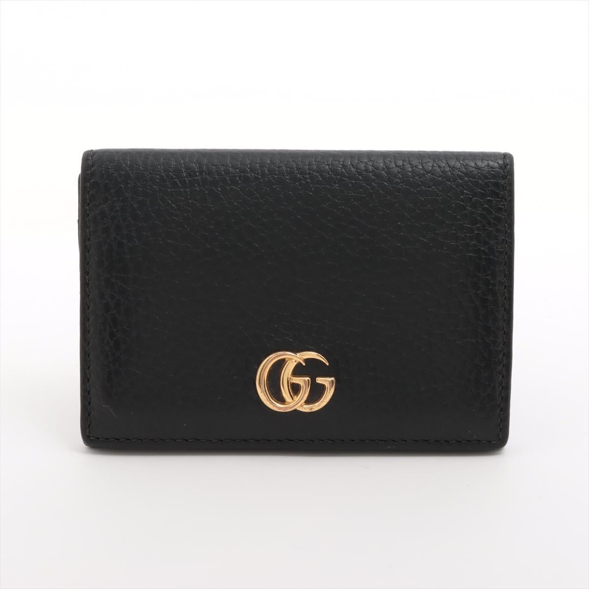 will ship about 4/1


The Gucci GG Marmont Leather Card Case in Black is a sleek and sophisticated accessory that embodies timeless luxury and functionality. Crafted from smooth black leather, it features the iconic GG Marmont logo in gold-tone