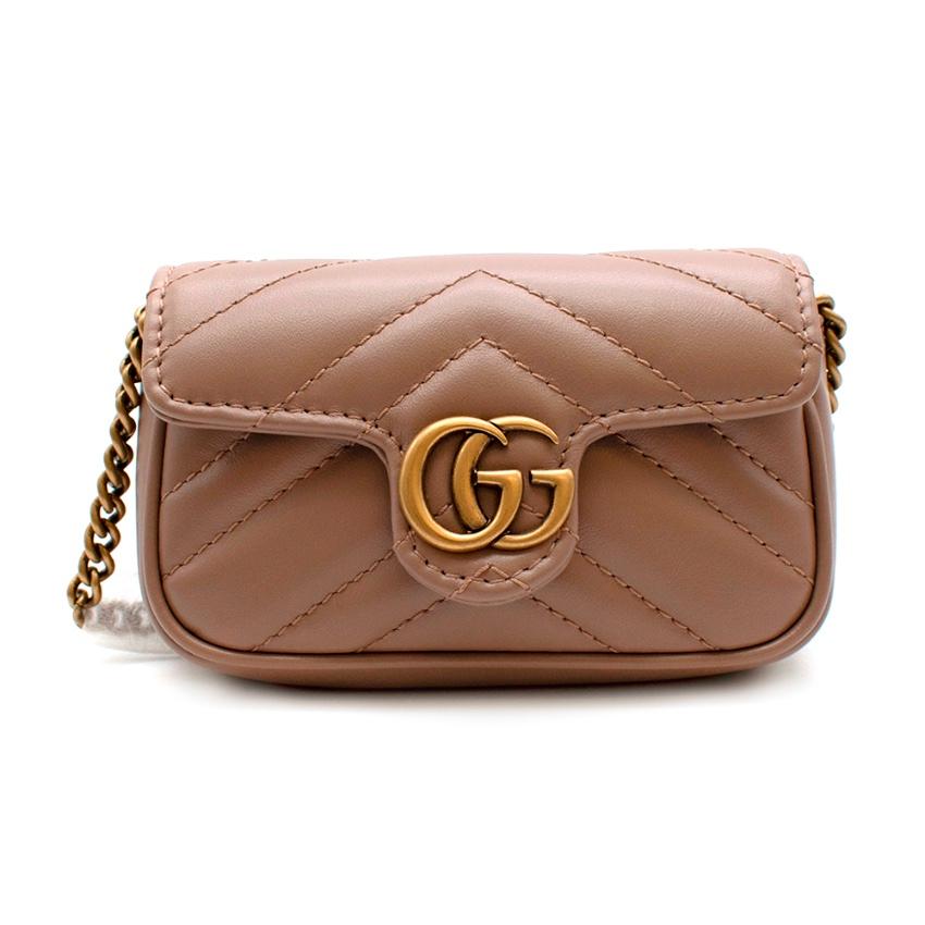The GG Marmont mini bag has a softly structured shape and a flap closure with Double G hardware. The hardware is inspired by an archival design from the '70s. Made in matelasse chevron leather.

- Dusty pink chevron leather with dusty pink leather