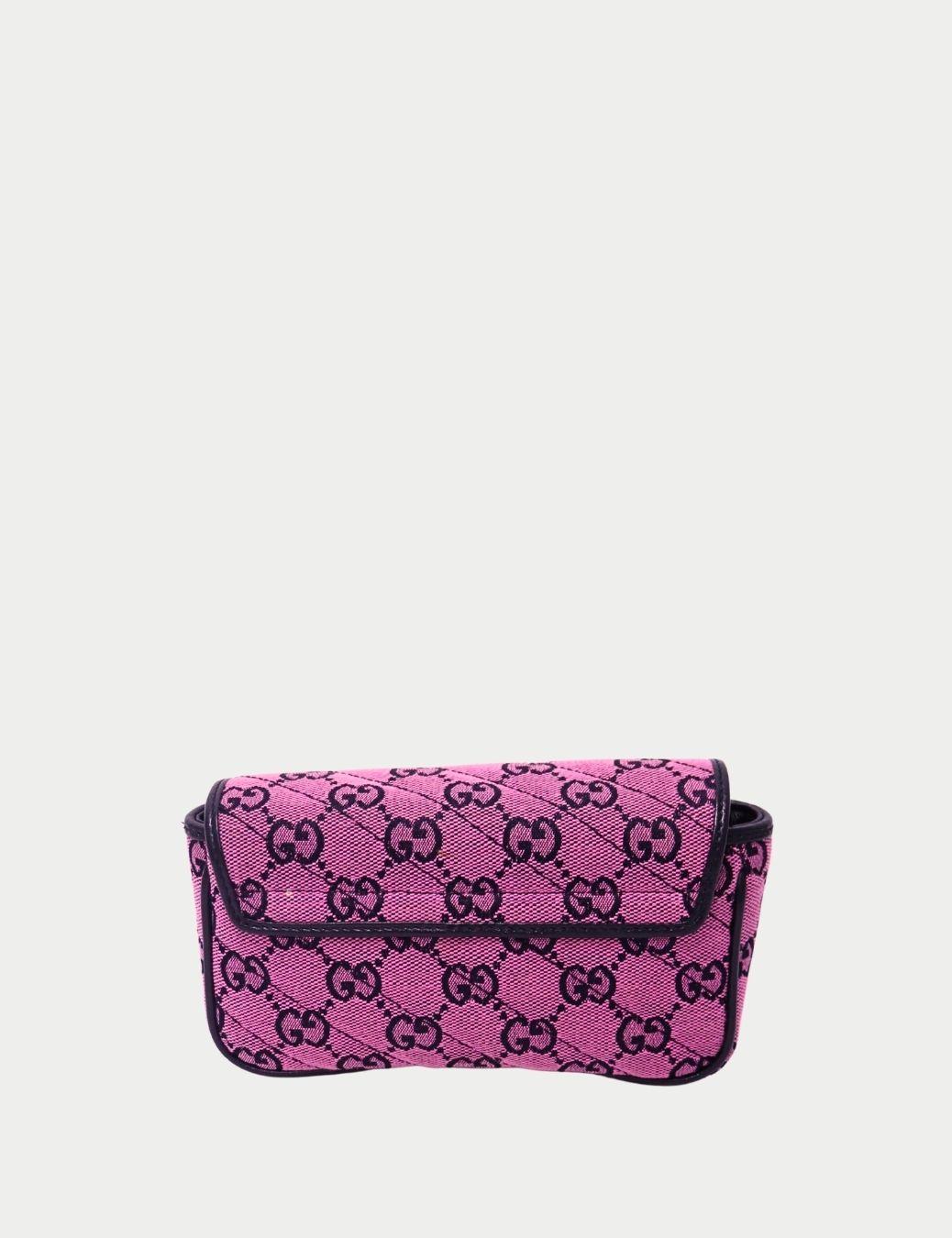 Add a playful yet elegant touch to your collection with this Gucci GG Marmont Mini Chain Bag in vibrant pink GG canvas. Crafted with the iconic double-G monogram pattern, this compact bag features black leather trim, antique silver-tone hardware,