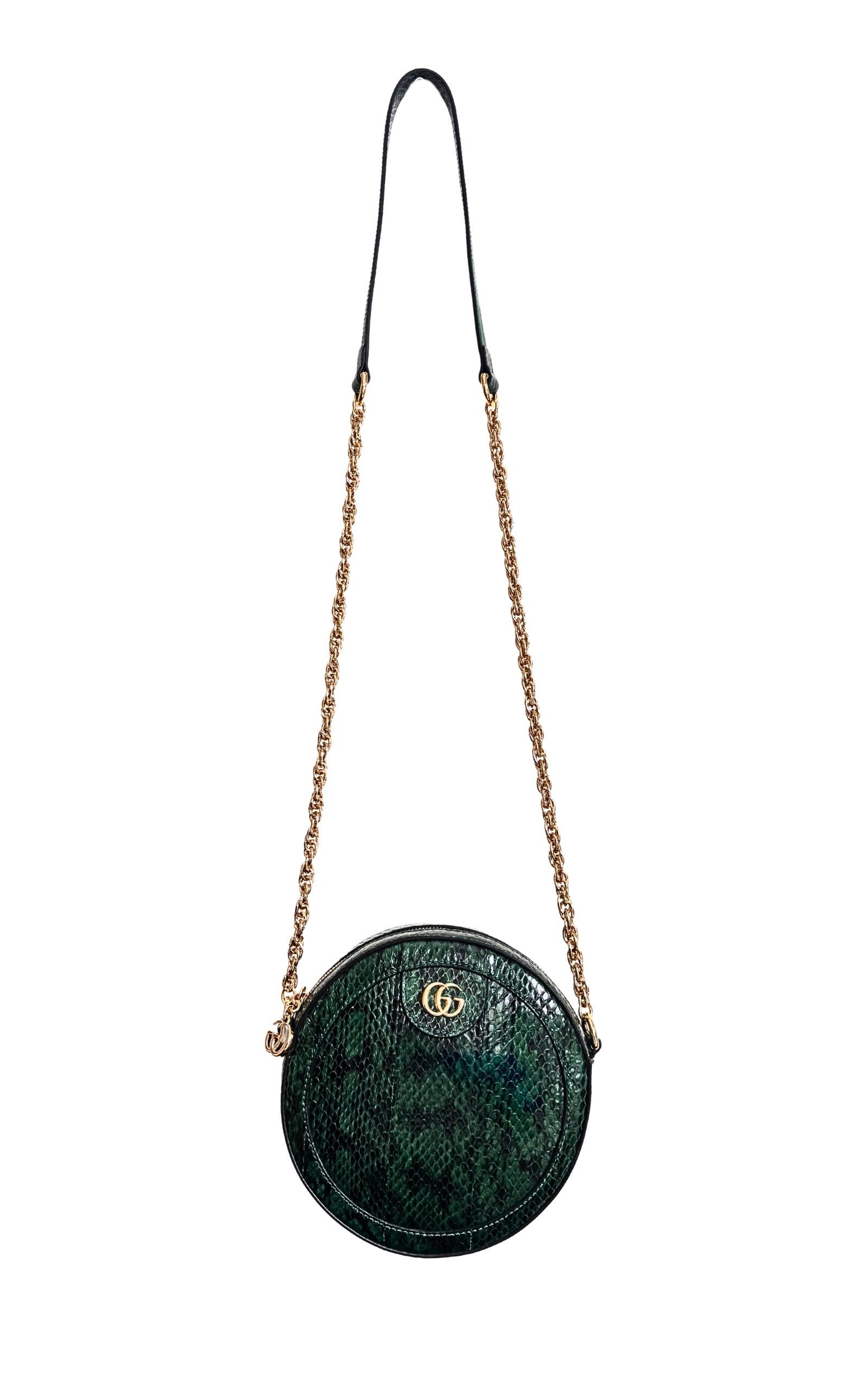 This GG Marmont Python Exotic Leather Bag  is designed with a playful rounded shape.
Finished with the distinctive double g hardware
Green snake skin, gold-toned hardware double g chain strap with leather detail with 22 drop zip closure can also be