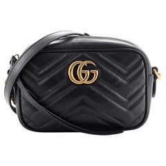 Gucci GG Sac à bandoulière Marmont Mini en cuir matelassé