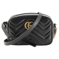 Gucci GG Sac à bandoulière Marmont Mini en cuir matelassé
