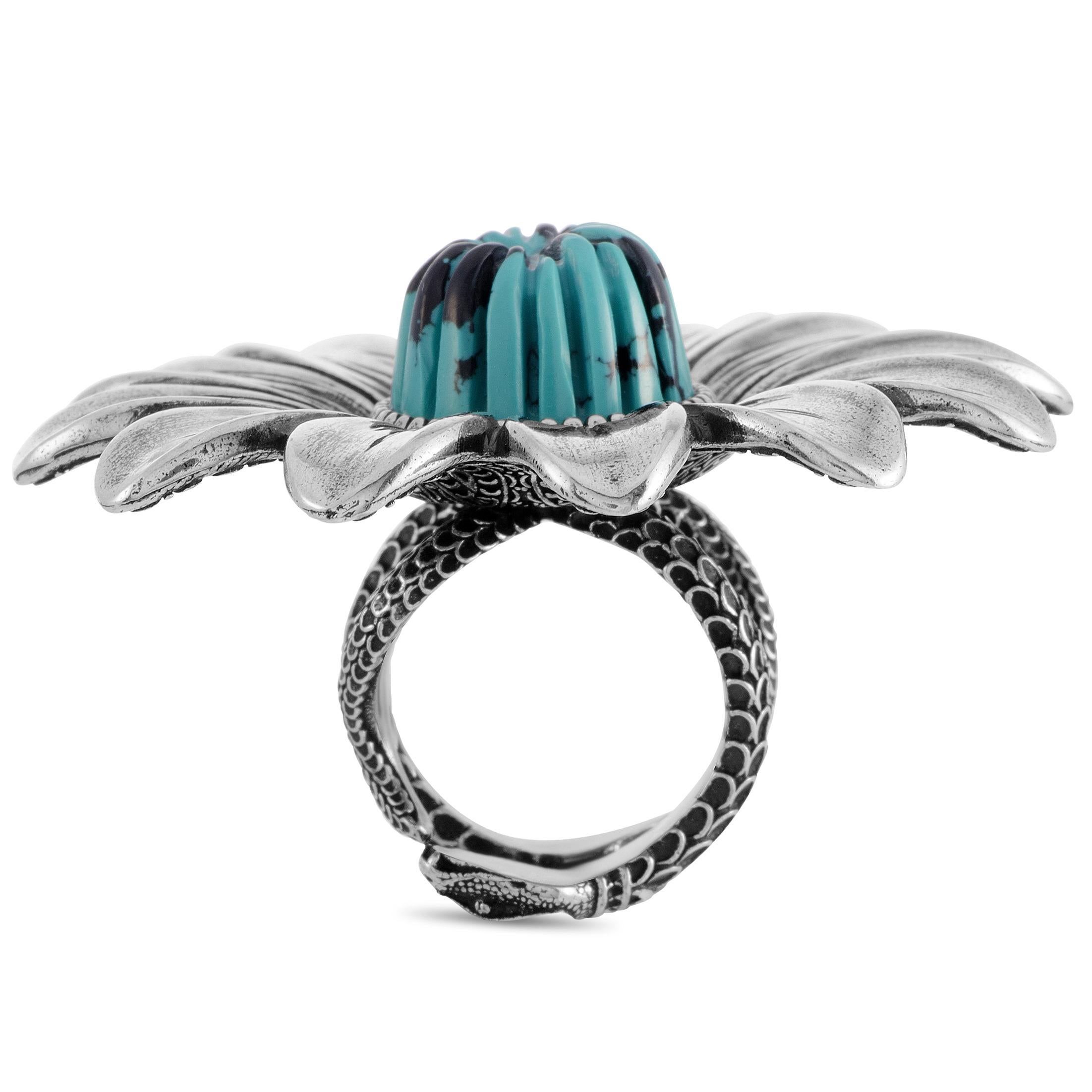The Gucci “GG Marmont” ring is made out of silver and turquoise resin and weighs 41.2 grams. The ring boasts band thickness of 15 mm and top height of 15 mm, while top dimensions measure 50 by 50 mm.
 
 This jewelry piece is offered in brand new