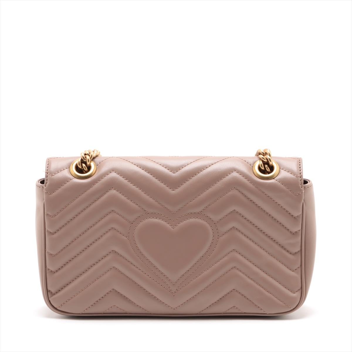 Step into luxury with the Gucci GG Marmont Small Chevron Leather Flap Bag in elegant beige. This exquisitely crafted bag is presented in excellent condition, showcasing the iconic chevron leather that radiates timeless sophistication. Perfect for