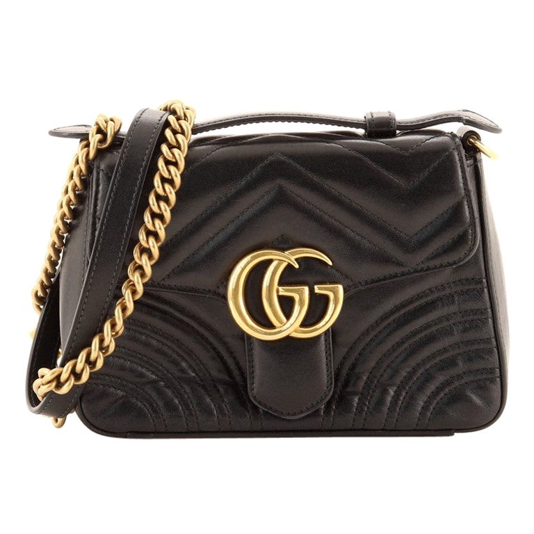 Gucci GG Marmont Tasche aus Matelasse-Leder mit Griff oben und Klappe