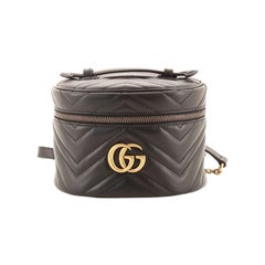 Gucci GG Marmont Vanity Sac à dos en cuir matelassé mini