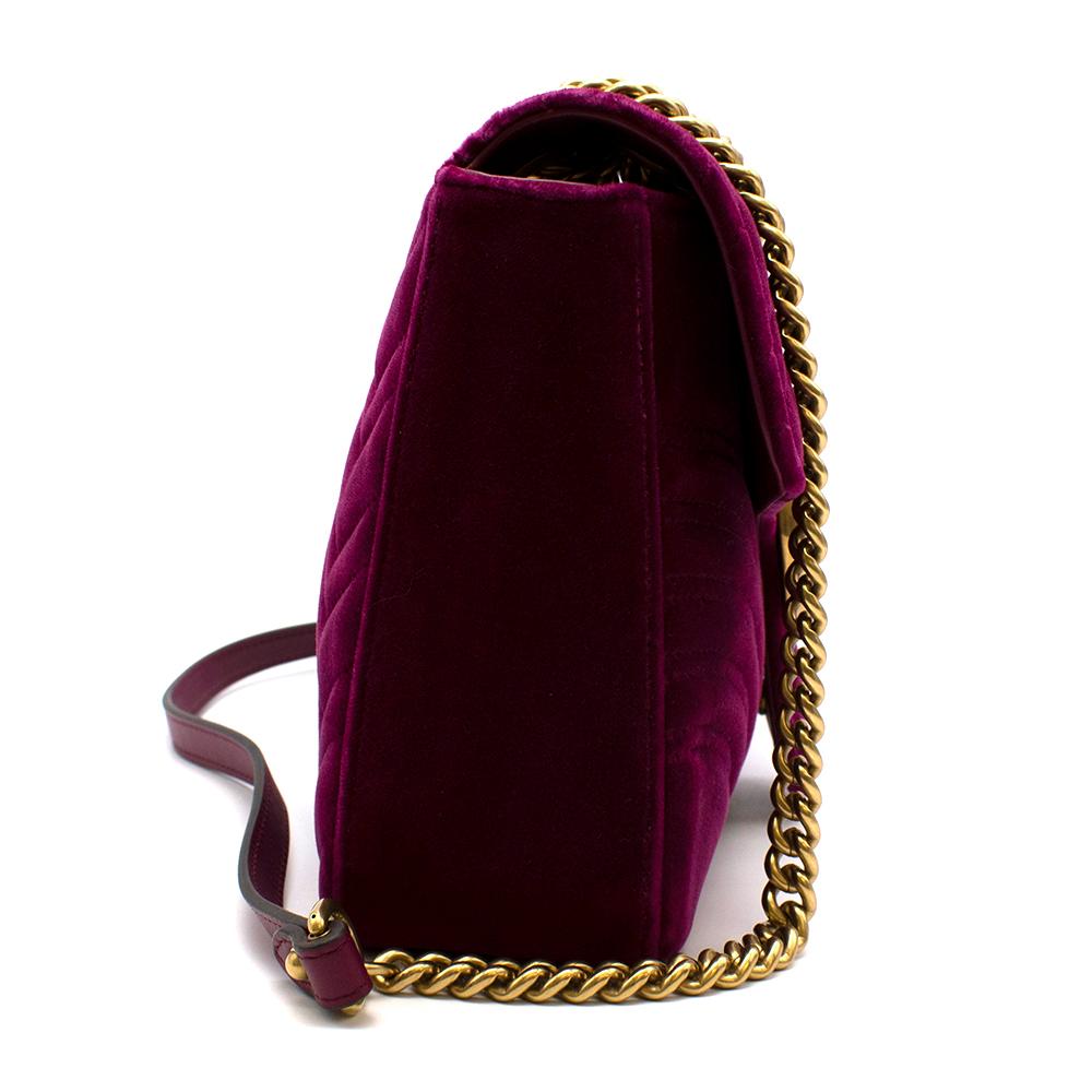 Gucci GG Marmount Purple Velvet Shoulder Bag 

-Iconic GG logo golden hardware 
-Super desirable style 
-Luxurious soft velvet texture
-Rich purple hue 
-Beautiful matelasse detailing 
-Heart quilted detail to the back 
-2 level shoulder straps
