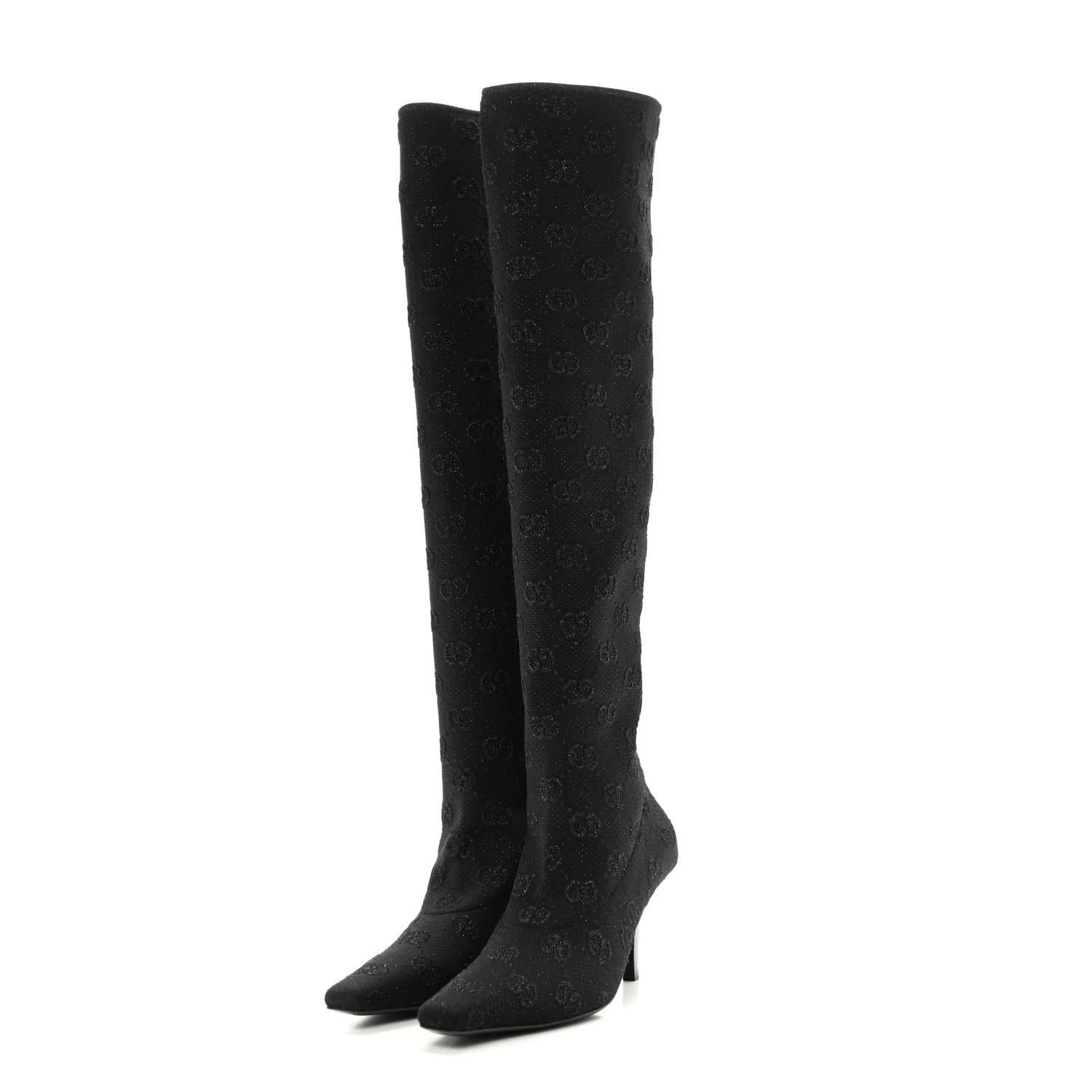 GUCCI GG MONOGRAM BLACK JERSEY KNIT KNEE HIGH BOOTS

Color: black with monogram print
Material: Jersey
Model No. 750574
Heel Height: 75 mm / 3”
Height of Boot Leg: 21”
Condition: Excellent. Like new
Comes with: Dust bag
Made in Italy