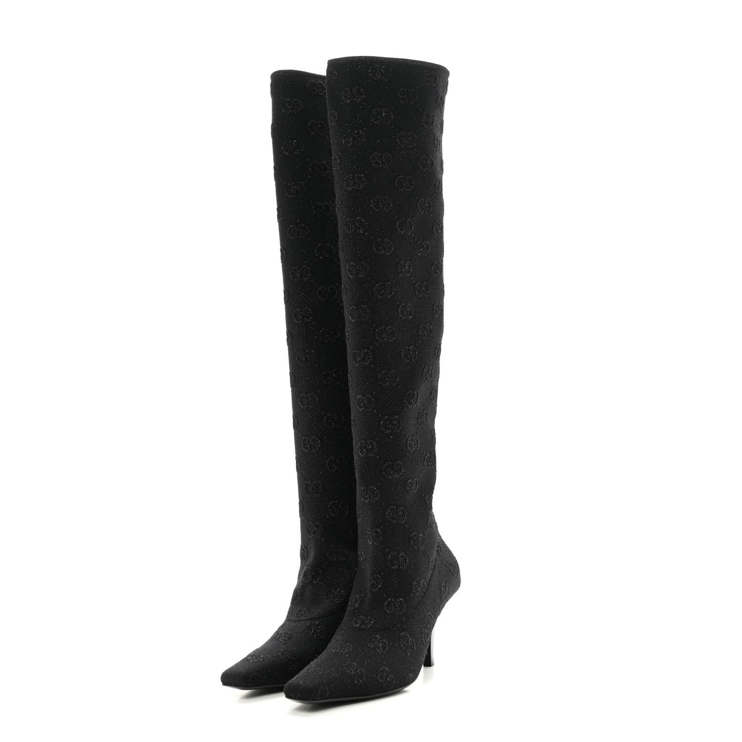 GUCCI GG MONOGRAM BLACK JERSEY KNIT KNEE HIGH BOOTS

Color: black with monogram print
Material: Jersey
Model No. 750574
Heel Height: 75 mm / 3”
Height of Boot Leg: 21”
Condition: Excellent. Like new
Comes with: Dust bag
Made in Italy