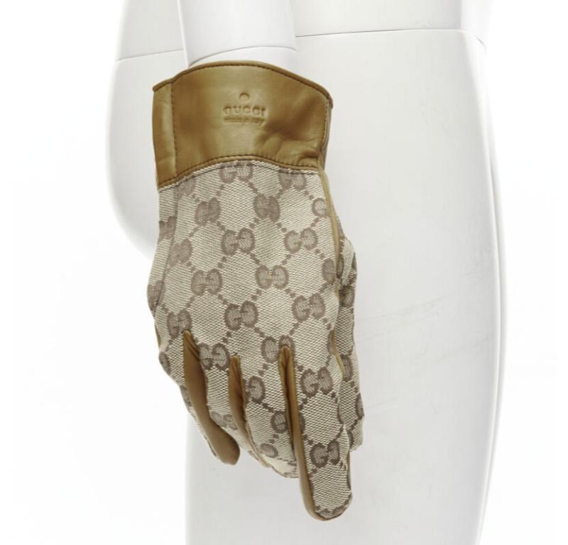 GUCCI GG monogram canvas brown leather trim cashmere lined glove Size 7
Reference: ANWU/A00896
Brand: Gucci
Material: Calfskin Leather, Canvas
Color: Brown
Pattern: Logomania
Closure: Half Zip
Lining:  Cashmere
Extra Details: Gucci emboss. Web trim