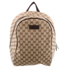 Gucci - Sac à dos en toile et ébène avec monogramme GG