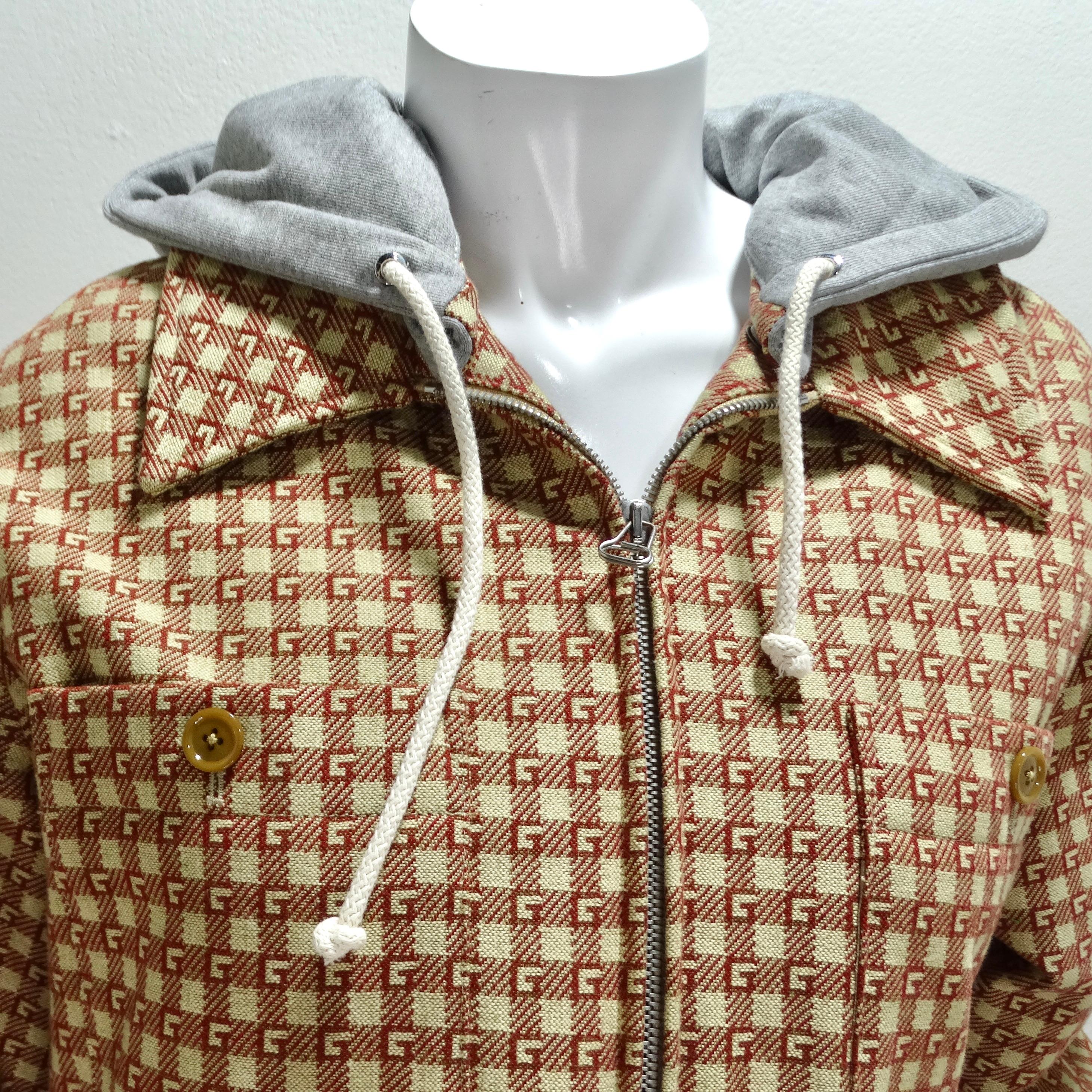 Introducing the iconic Gucci GG Monogram Hooded Jacket, a timeless and versatile piece that exudes luxury and style. Crafted from high-quality wool, this classic button-up jacket features Gucci's signature red and beige GG monogram throughout,