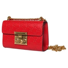 Gucci, GG printed padlock bag in red leather