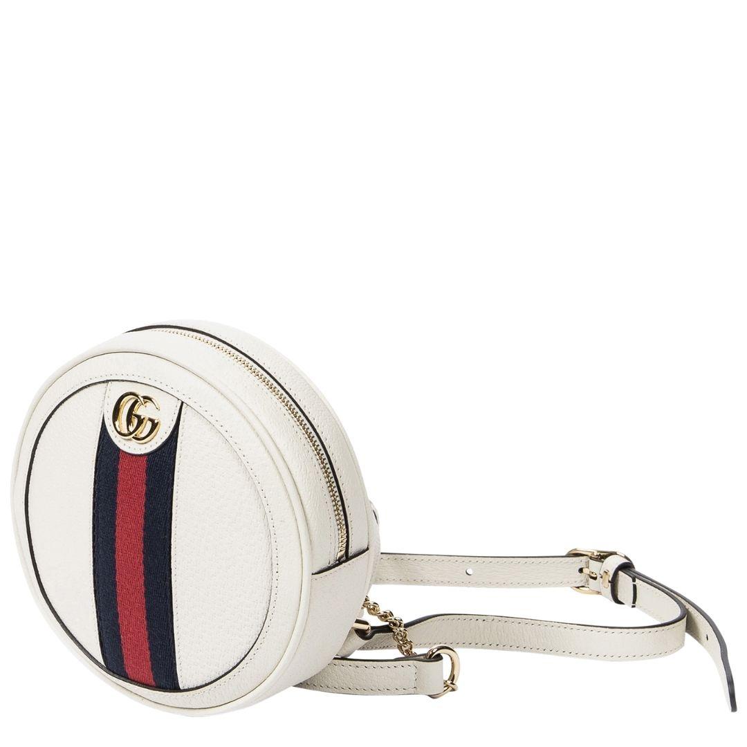 The perfect on the go mini backpack has arrived! Crafted in ivory calfskin leather with iconic navy and red stripes down the center, gold hardware, and double ivory leather straps with gold chain links. The zipper closure opens to a suede interior