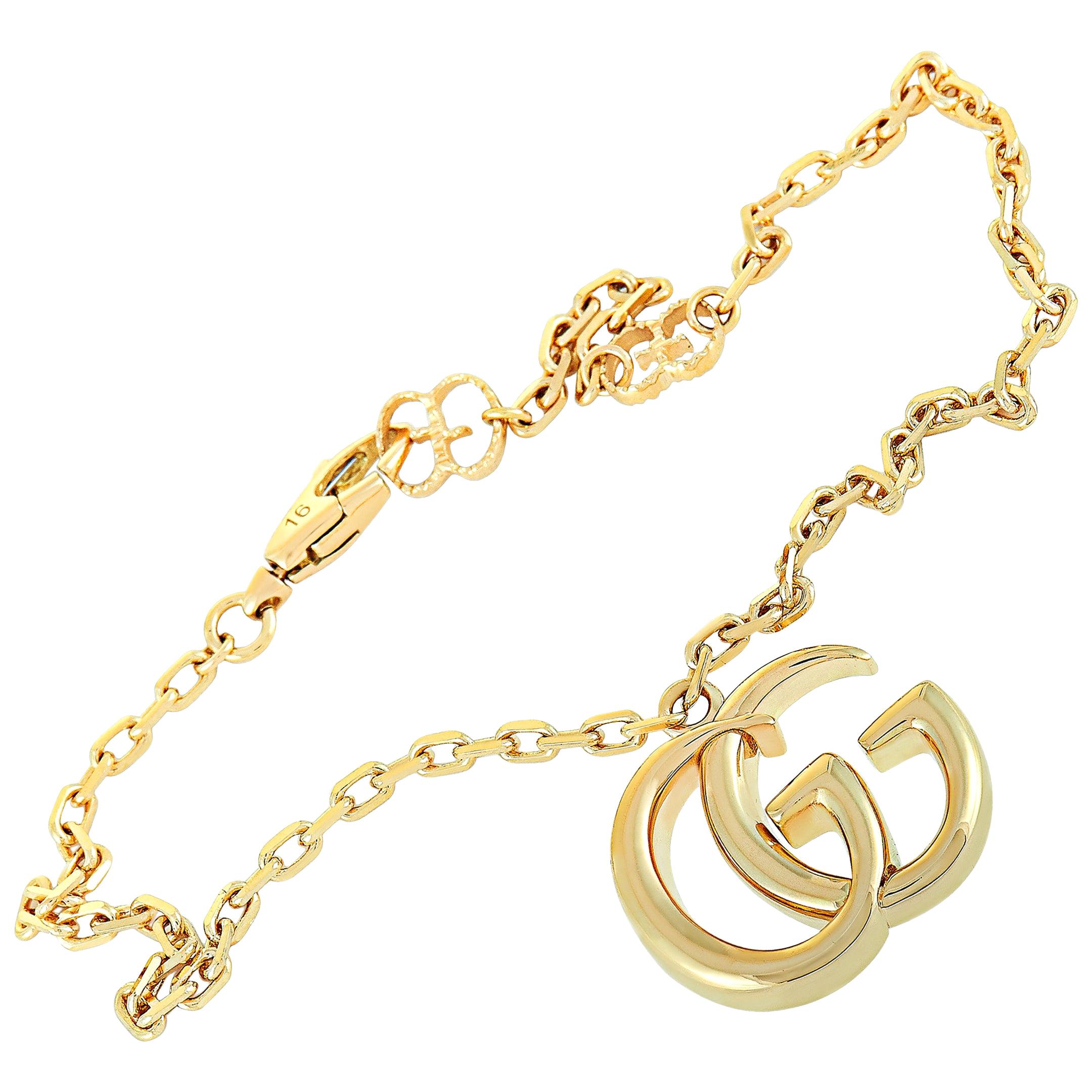 Gucci GG Running 18 Karat Yellow Gold Double G Charm Bracelet at 1stDibs