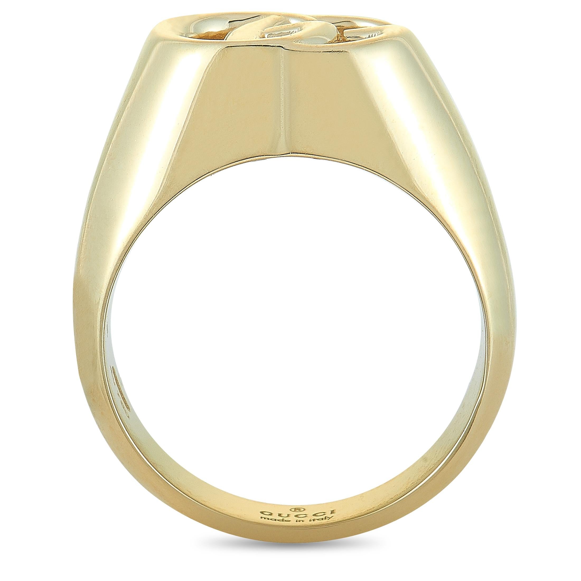 The “GG Running” ring by Gucci is crafted from 18K yellow gold and weighs 12.2 grams. The ring boasts band thickness of 3 mm and top height of 5 mm, while top dimensions measure 12 by 9 mm.

This item is offered in brand new condition and includes