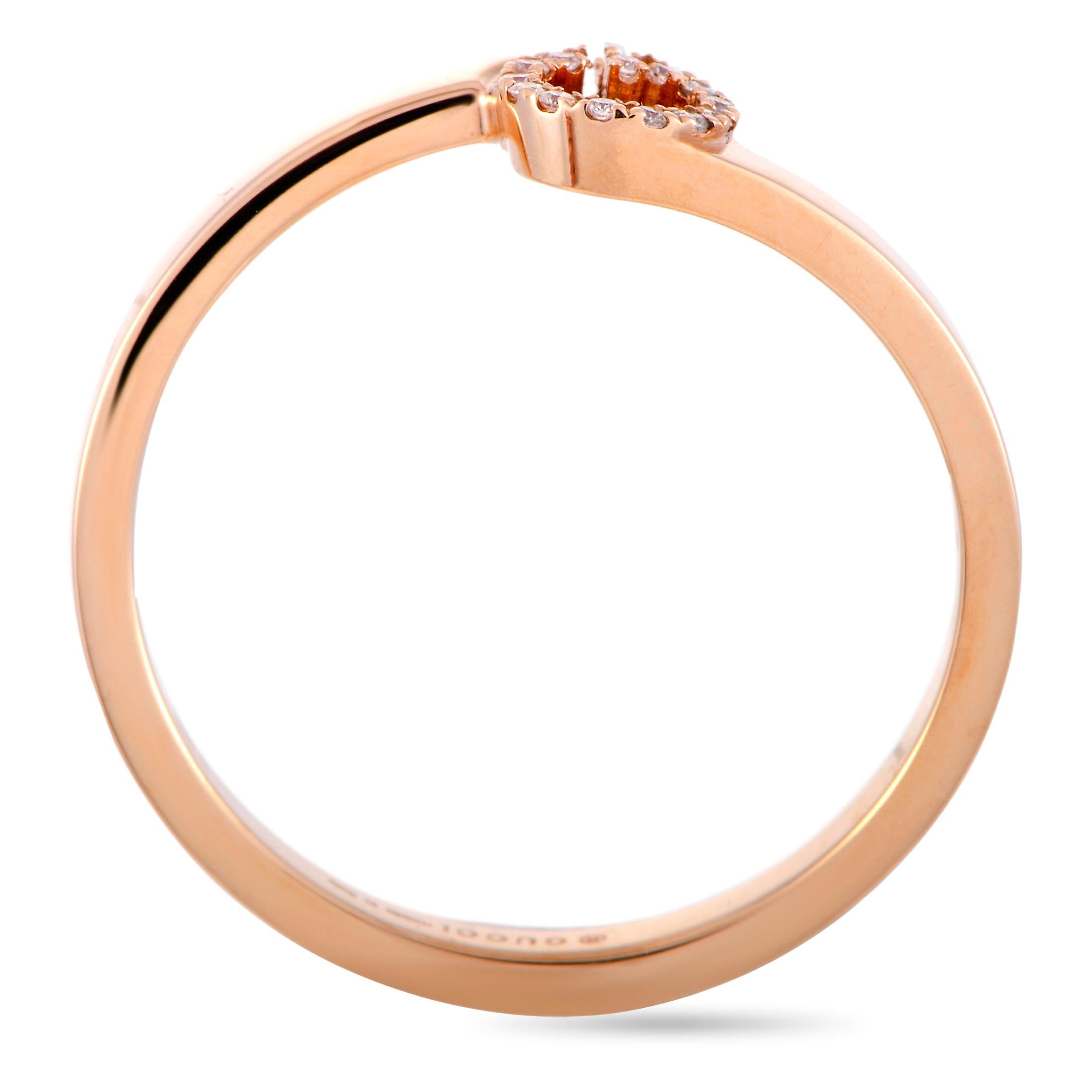 The “GG Running” ring by Gucci is made out of 18K rose gold and diamonds and weighs 2.6 grams. The ring boasts band thickness of 2 mm and top height of 2 mm, while top dimensions measure 7 by 5 mm.

This item is offered in brand new condition and