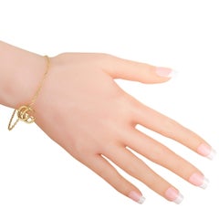 Gucci GG Running 18 Karat Yellow Gold Double G Charm Bracelet