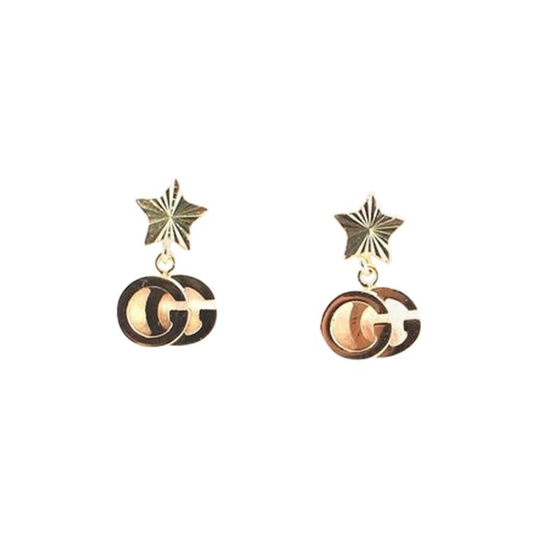 Gucci GG Running Star Drop Earrings 18 Karat Yellow Gold at 1stDibs
