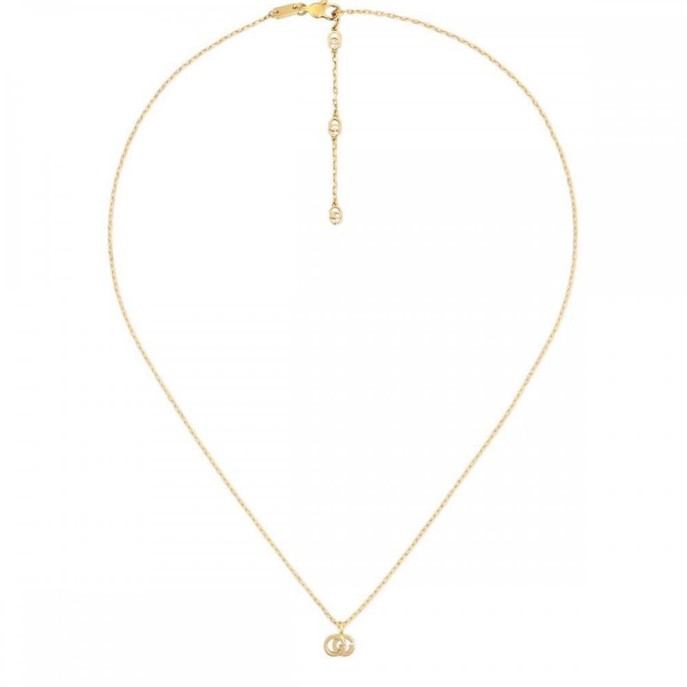 Feature the iconic GG logos, this Gucci GG Running pendant necklace is ideal for any occasion. Crafted in 18kt yellow gold, this necklace features a lobster clasp for a look that is vibrantly chic and functional. As an international icon with a
