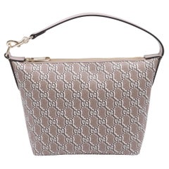 Sac à bandoulière Gucci GG Shadow Monogram Super Mini Ophidia en cuir beige