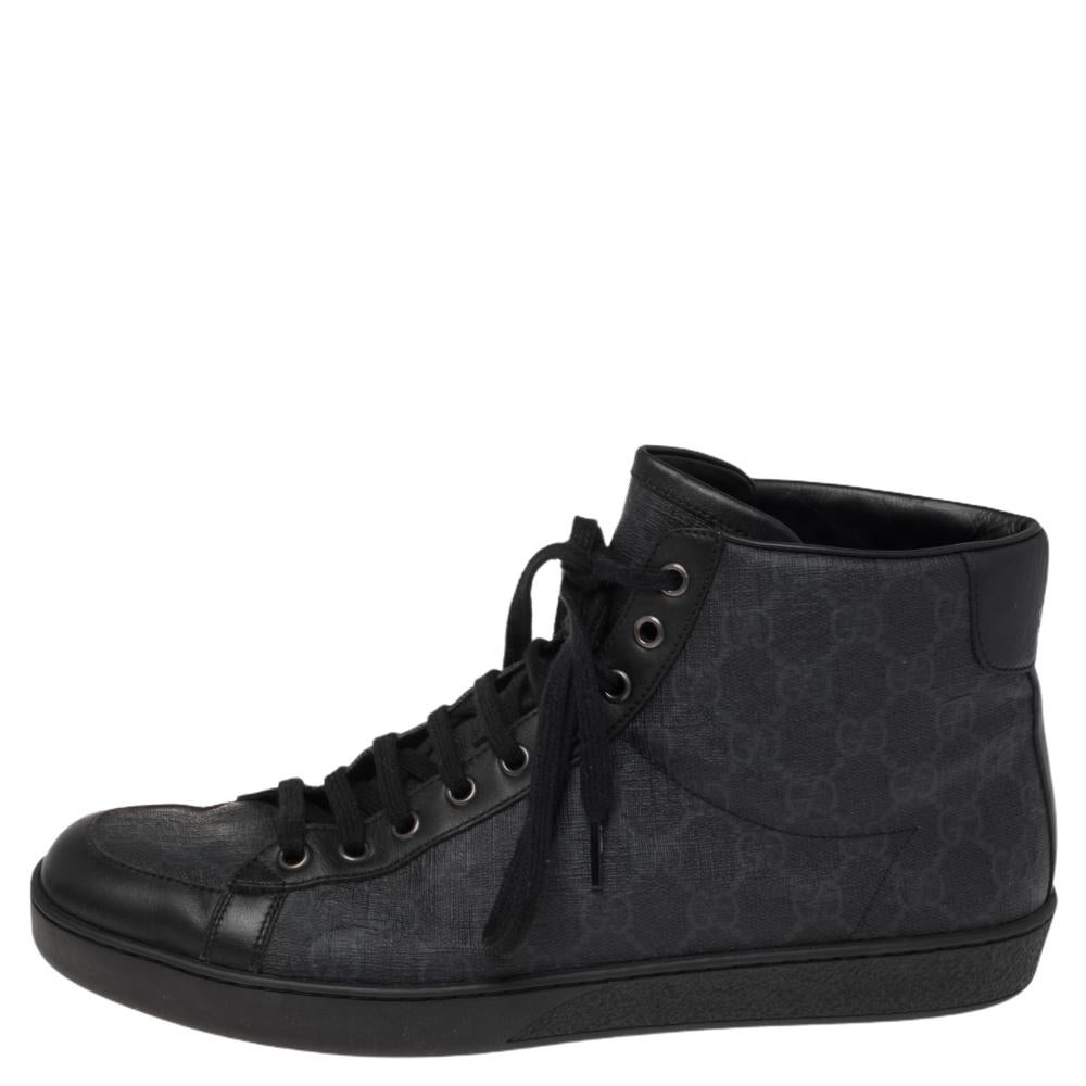 Look dapper in casuals with these gorgeous Gucci sneakers. Crafted in signature GG canvas and leather, they feature a front lace-up fastening. Wear them with denims for a stylish you! The insoles are leather-lined with embossed brand