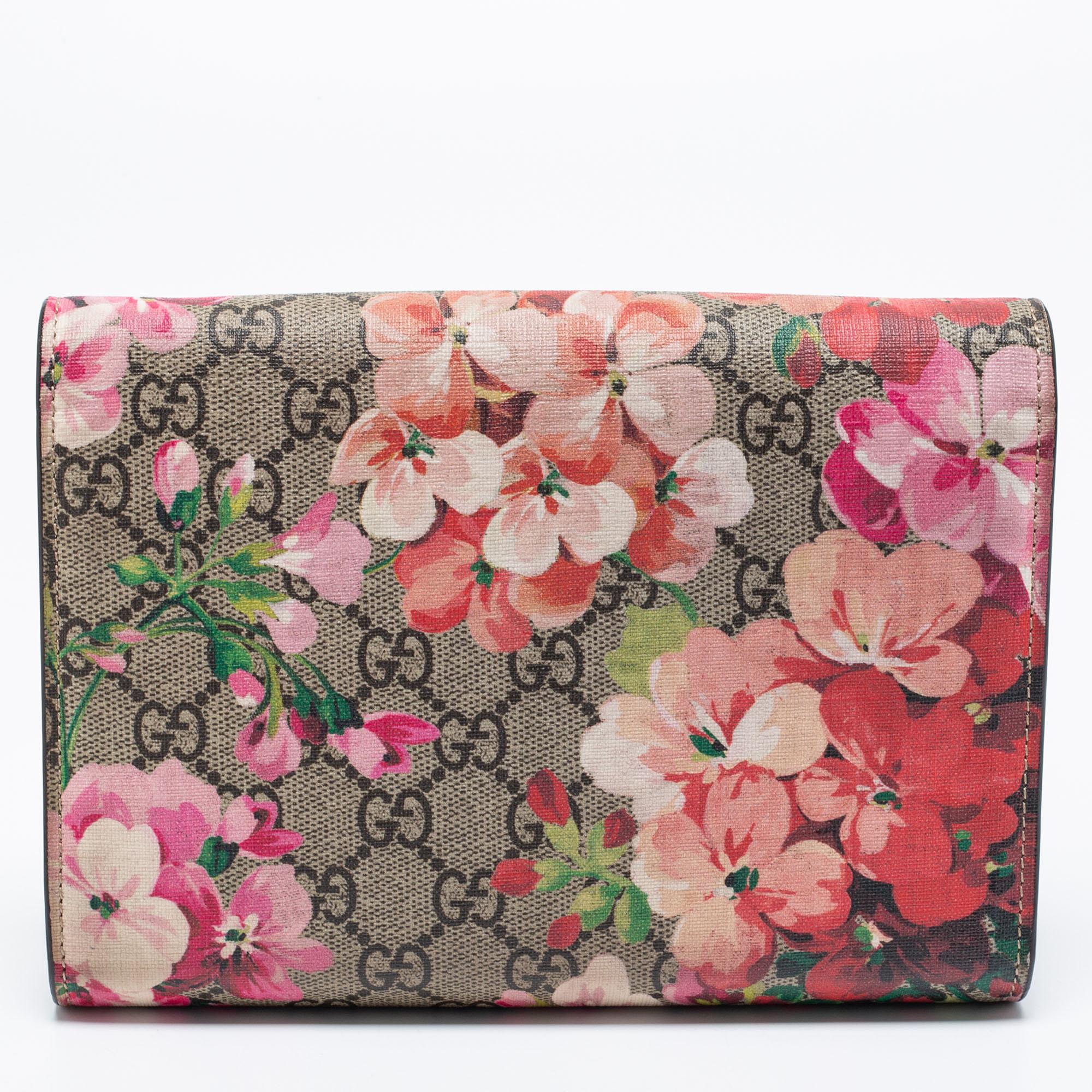 Gucci's Dionysus collection is inspired by the Greek God who is believed to have crossed the Tigris river on a tiger given to him by his father, Zeus. This creation has been beautifully made from GG Supreme canvas and leather with Blooms print. The