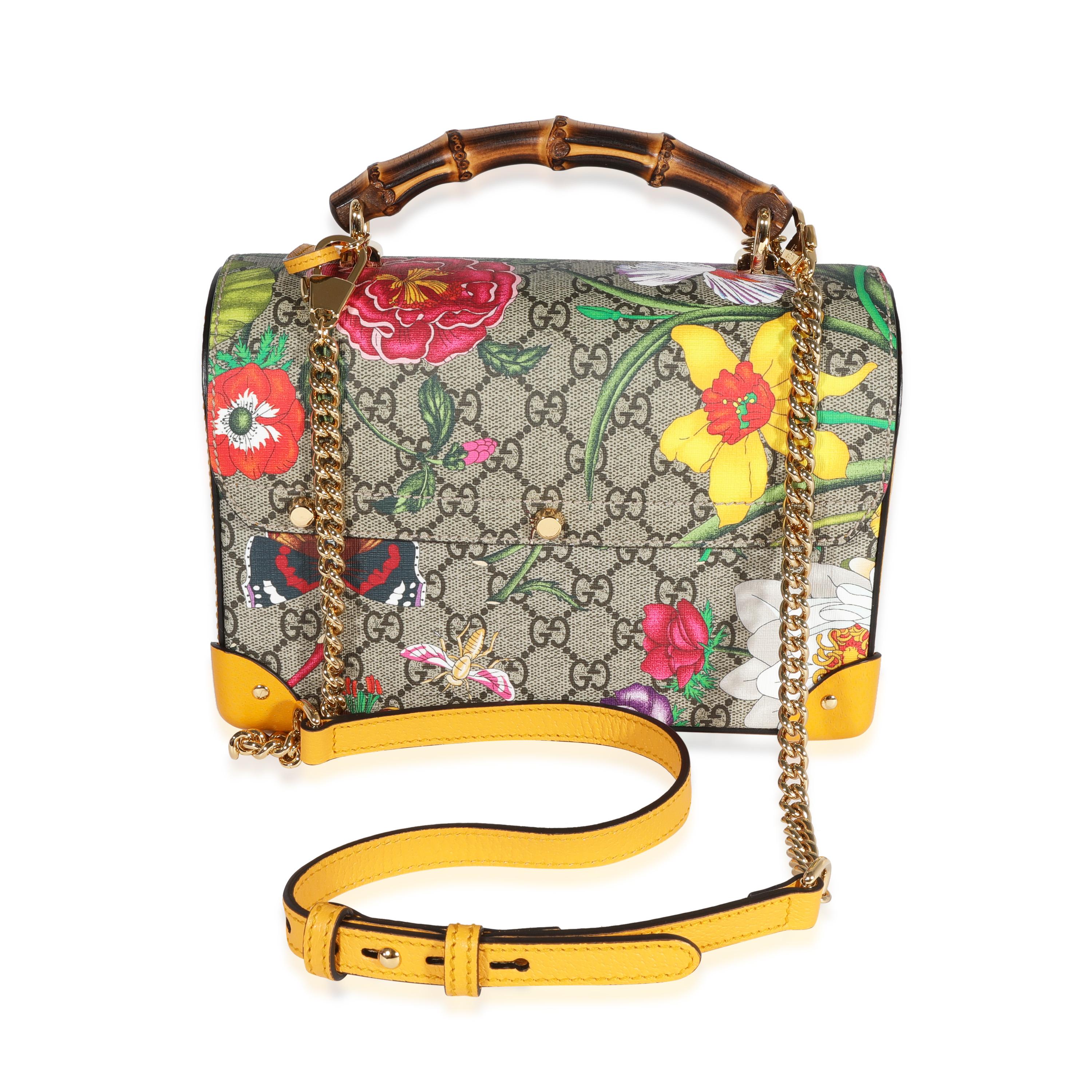 Listing Title: Gucci GG Supreme Flora Small Padlock Bamboo Bag
SKU: 122086
MSRP: 2630.00
Condition: Pre-owned 
Handbag Condition: Excellent
Condition Comments: Excellent Condition. Faint marks at corners. Minor scratching at hardware. No other