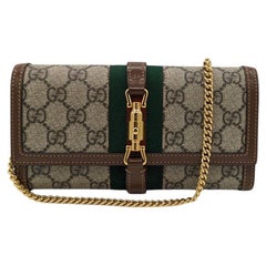 Portafoglio a catena Gucci GG Supreme Jackie 1961 Marrone