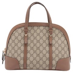 Bolso de piel Gucci GG Supreme Marrón